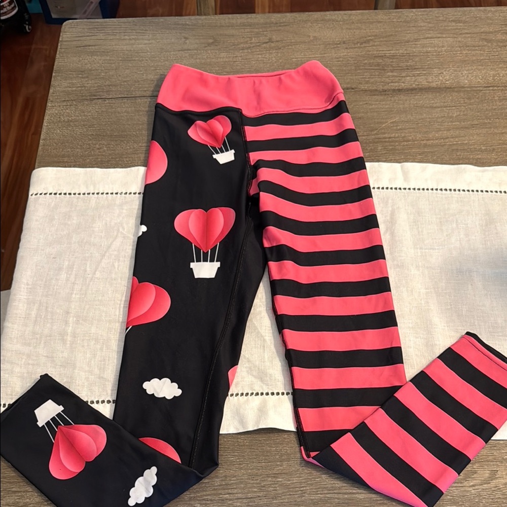 Playful Pink and Black Split-Design Leggings